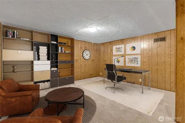 Additional bonus room/office on lower level also features ample closet storage.