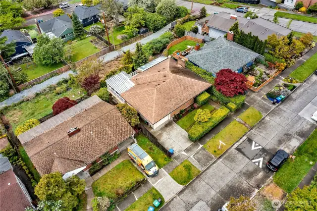 Street parking, off street parking and a single car garage! Bring your vision to the West Seattle Mid-Century home.