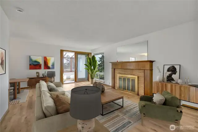 Living room leads to fully enclosed sun-porch.