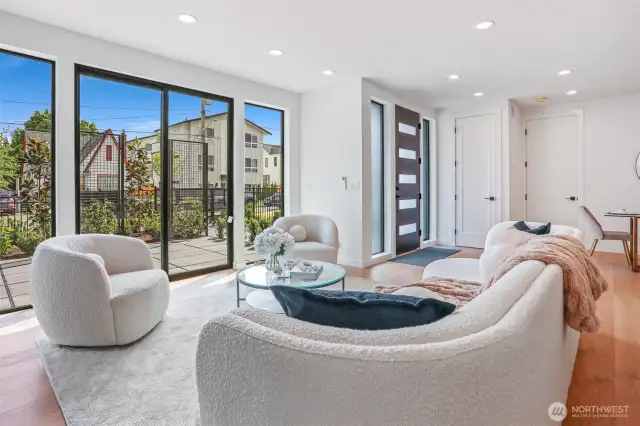"Wall of Windows" with Oversized Slider to Private Fenced Patio Area
