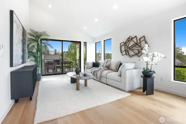 Huge Upper Level Media Room with Vaulted Ceilings, Oversized Sliders to Covered View Deck