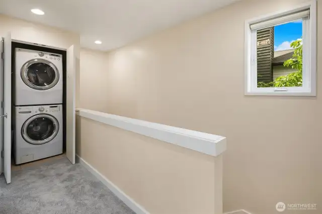Washer and dryer are near upper bedrooms.