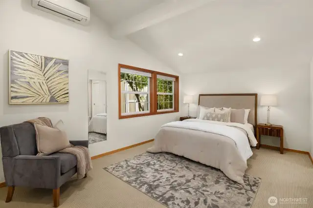 Primary bedroom with walk in closet, ensuite full bath and mini-split AC/Heating for year round comfort