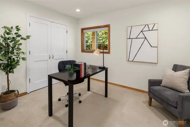 Bedroom one staged as an office