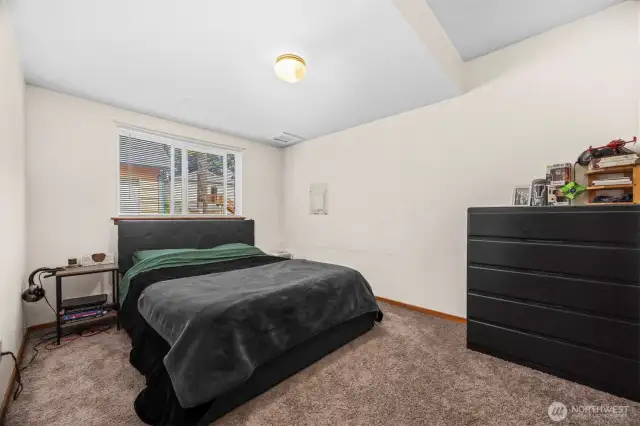 Bedroom in lower duplex unit.