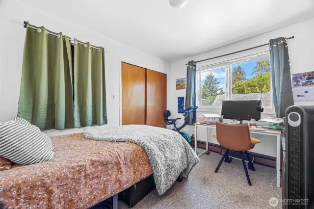 Bedroom in upper duplex unit.
