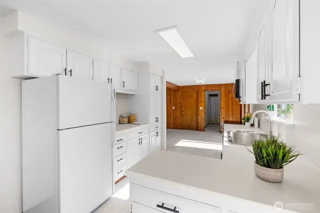 The kitchen is open, wide and wonderful