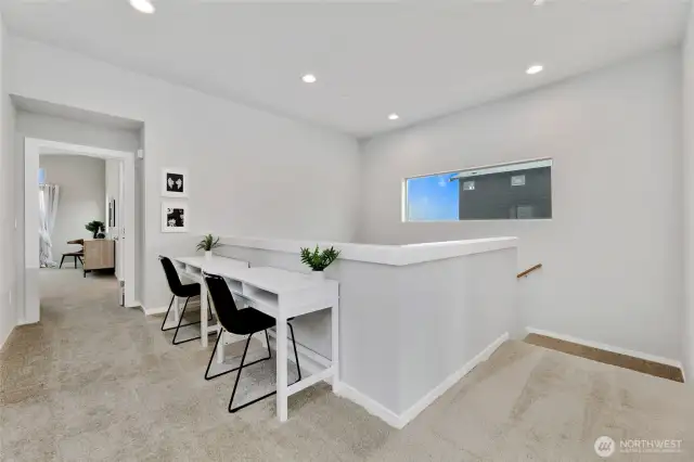 open upstairs with vaulted celings