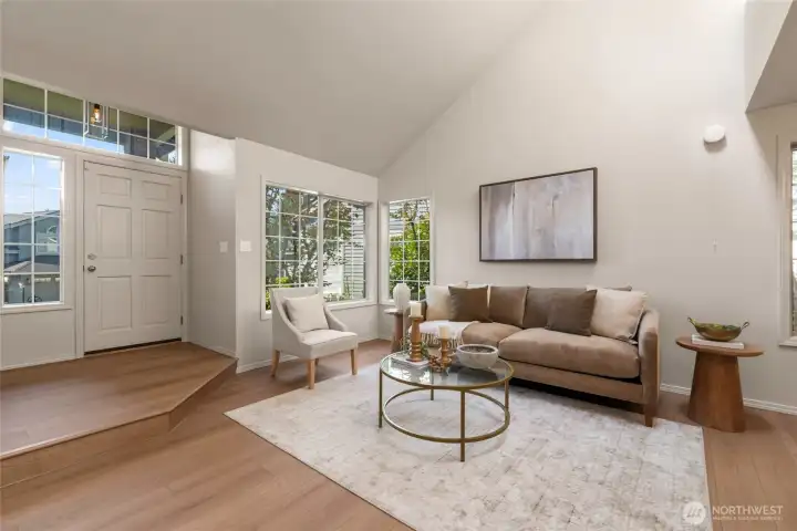 High ceilings and bright windows great you as you walk in the front door.