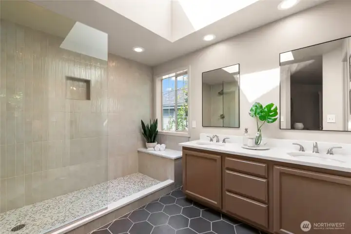 Primary bath with beautiful walk-in shower.