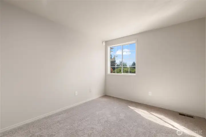 2nd bedroom upstairs window facing the front yard.
