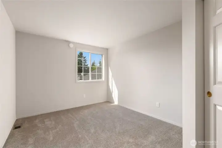 3rd bedroom next to 2nd bedroom upstairs also facing the front yard.