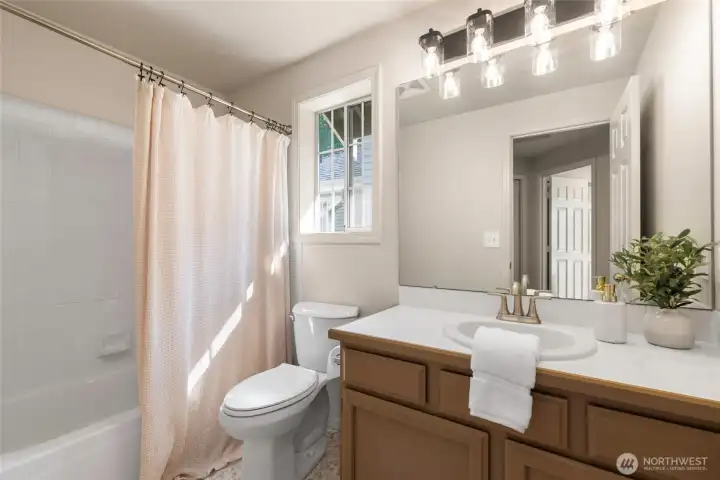 Upstairs full bathroom next to bedrooms 2&3.