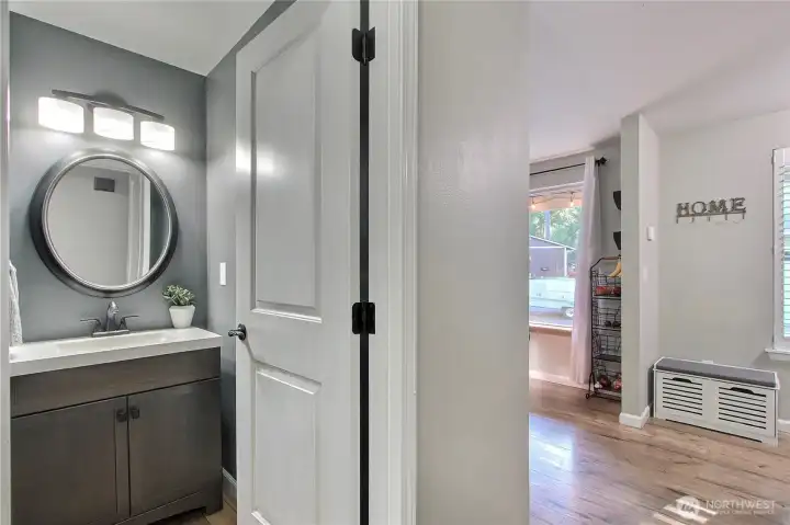 In the entry hall you will find your powder room. I love that it is NOT right off of the kitchen or living areas!