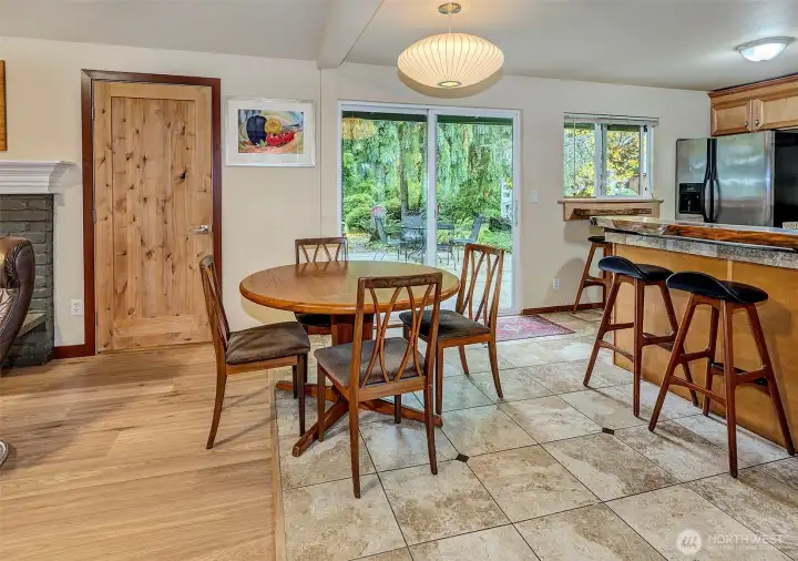 Tiled Dining Area. Left Door Leads To Large Utility Room.