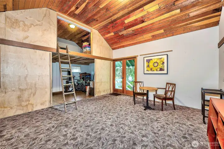 Open Loft Area And Wood Trimmed Ceiling.