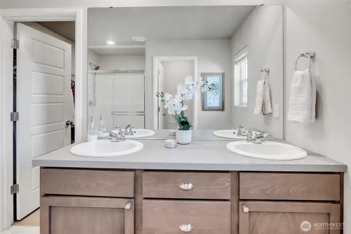 Primary ensuite with dual sinks.