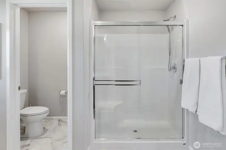 Primary ensuite with walk-in shower.