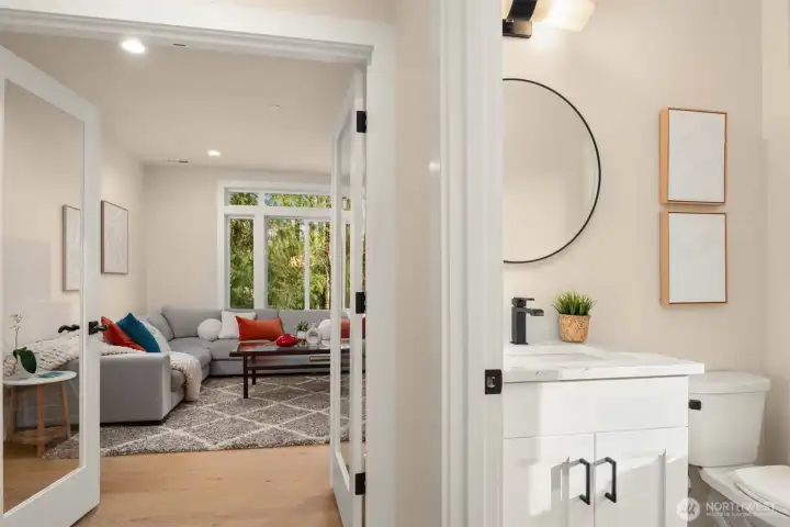 The half bath on the main floor is conveniently situated next to the office/4th bedroom option.