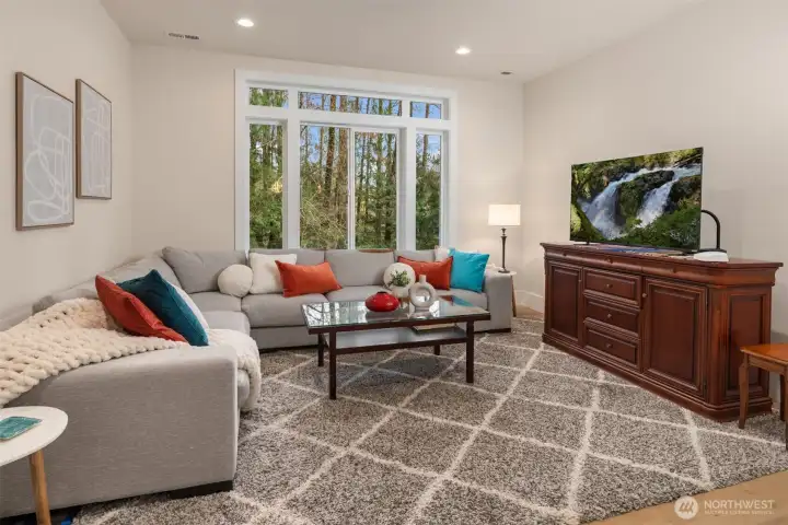 The main floor offers an office or optional fourth bedroom that works beautifully for guests, working from home, or multigenerational living.