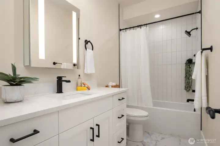 The 2nd full bath on the upper level