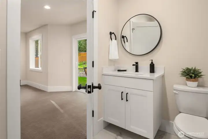 The lower level 1/2 bath.