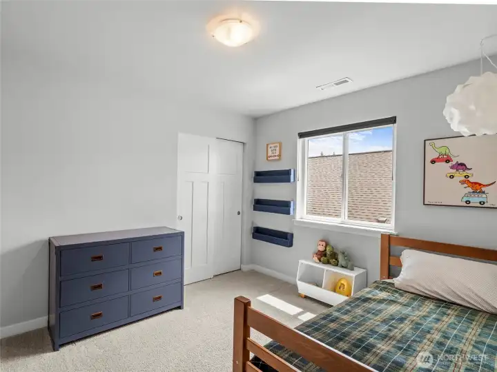Bright and cheerful third bedroom.