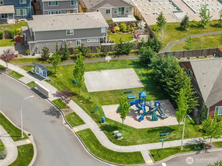 Bradbury Park is just a short walk from the front door, featuring a full playground structure, basketball court, benches, and open green space. A wonderful neighborhood amenity.