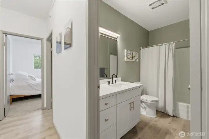 View from hall. Bath convenient between 2 bedrooms