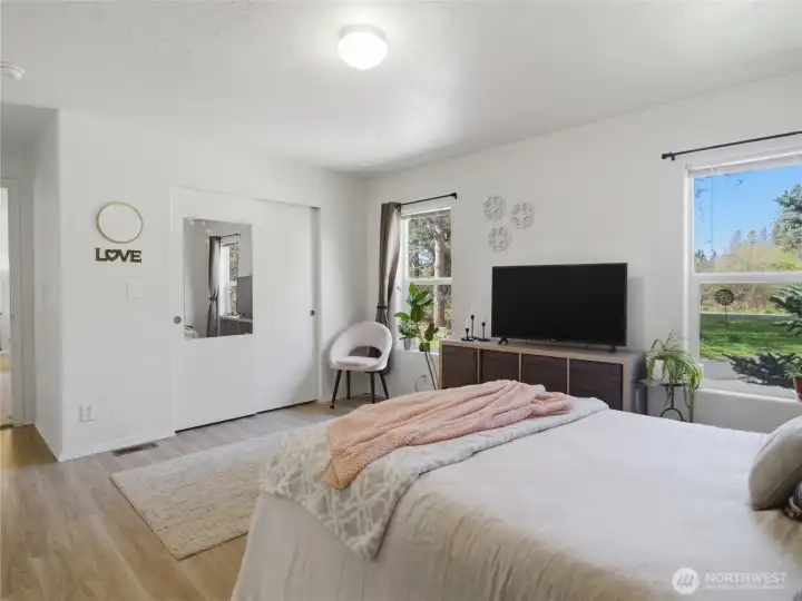 Two windows to bring in lovely natural light as well as peaceful views.