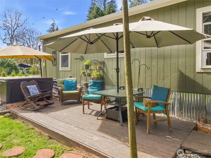 Hot tub and patio area are a great place to relax after a long day.