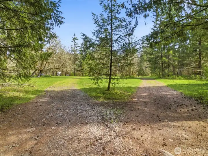 The back of the property opens up to a beautiful clearing.