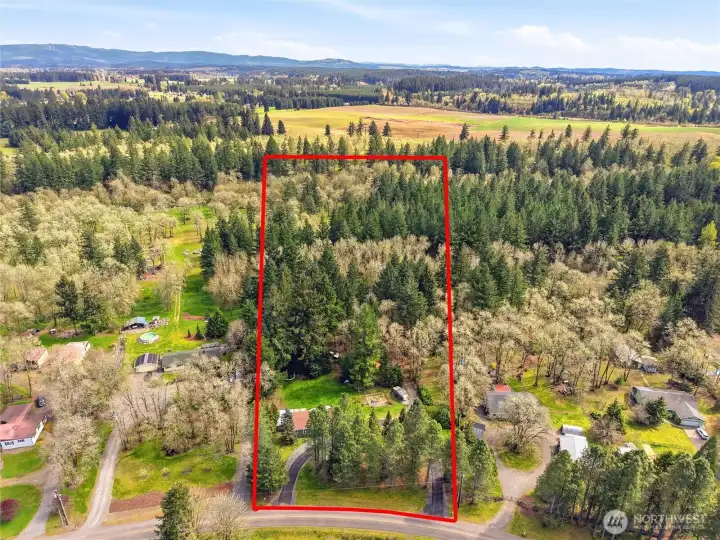 Tucked away on 6.4 private wooded acres.  It is a secluded retreat with modern comforts and easy access to town.