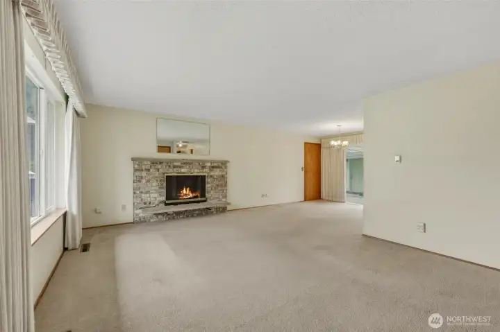 Hardwood oak flooring under living room carpet.
