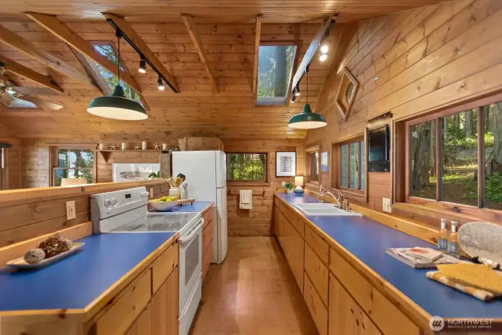 Open concept living area allows you to enjoy the view even when preparing your meals. Open concept living area allows you to enjoy the view even when preparing your meals.