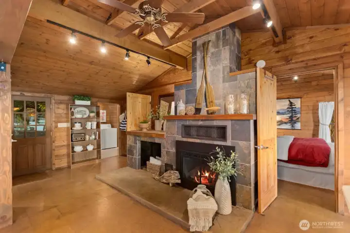 The south side of the cabin features two bedrooms, a laundry room, and a full bathroom. The south side of the cabin features two bedrooms, a laundry room, and a full bathroom.