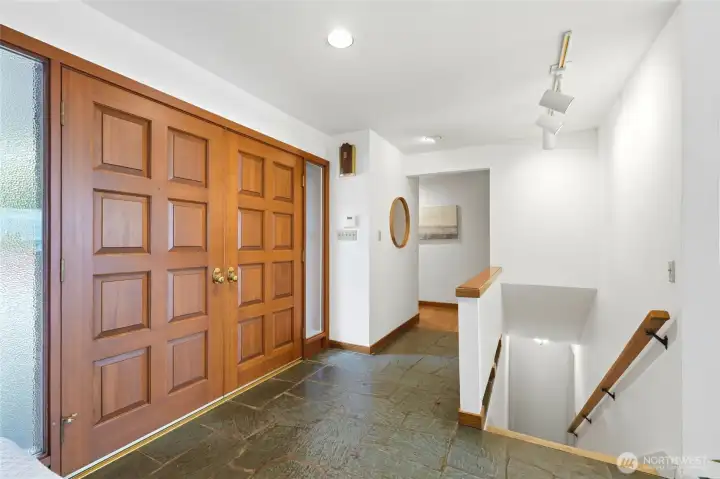 Open foyer that can see across the living room to the view window.