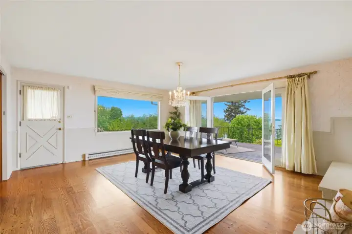 French doors in dining room lead to big view deck.