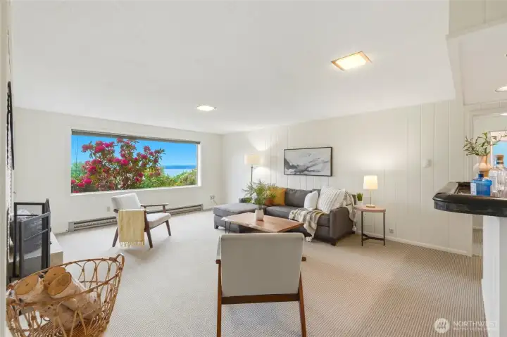 Rec room in daylight baasement with view and wetbar.
