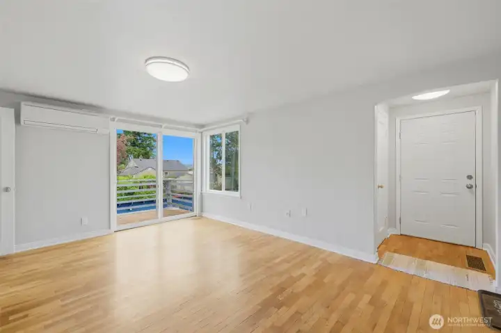 Entry and living space with access to large deck.