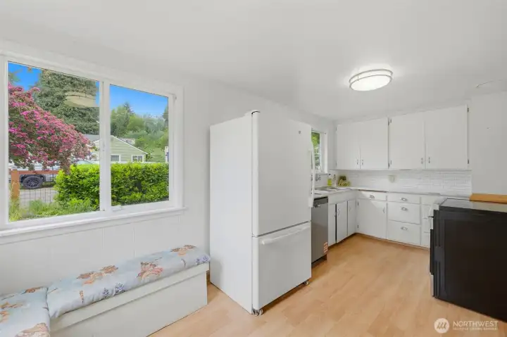 Kitchen with eating space off living room