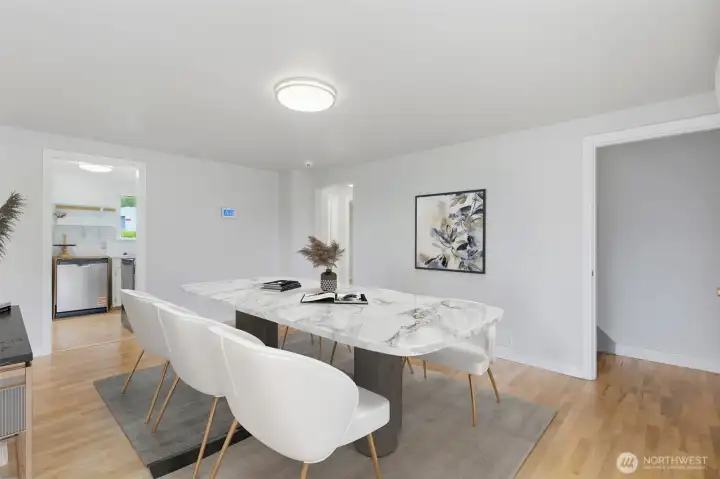 This space is the upstairs living room - but could be used as a large dining space perfect for entertaining.