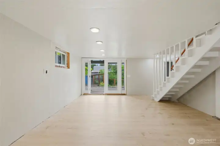 Basement, partially finished with french doors that lead to private backyard