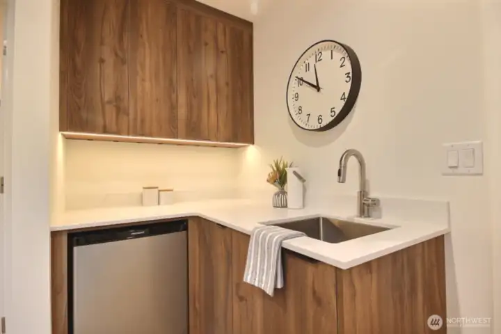 The main floor has a kitchenette and mini-refrigerator.