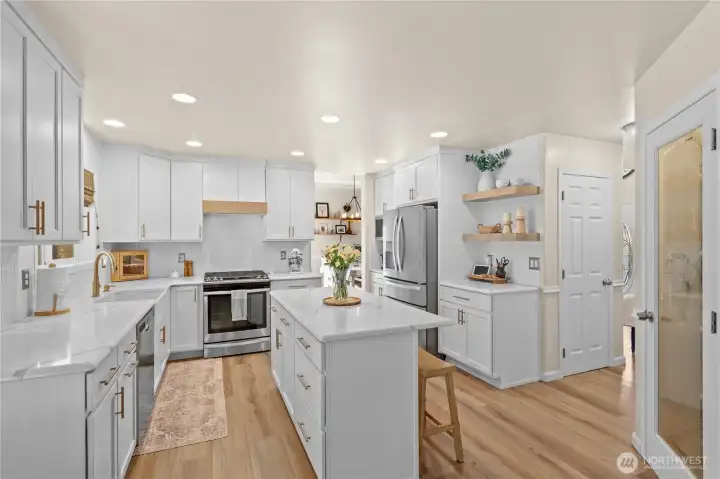 Island, Stainless Steel Appliances with Gas Range. Pantry with Glass Door.