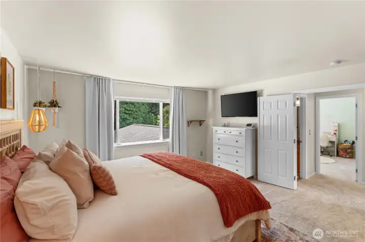 Primary Bedroom w/Double Door Entry and newer Carpets.