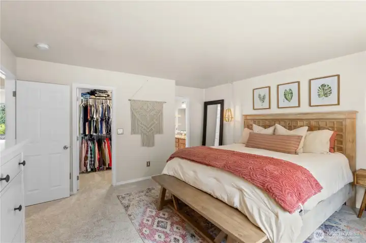 Primary Bedroom w/Walk-In Closet and En Suite Bath.