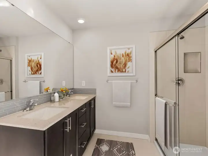 Primary bathroom has 2 vanities and plenty of counter space. Photos are for representational purposes only. Colors and options may vary.