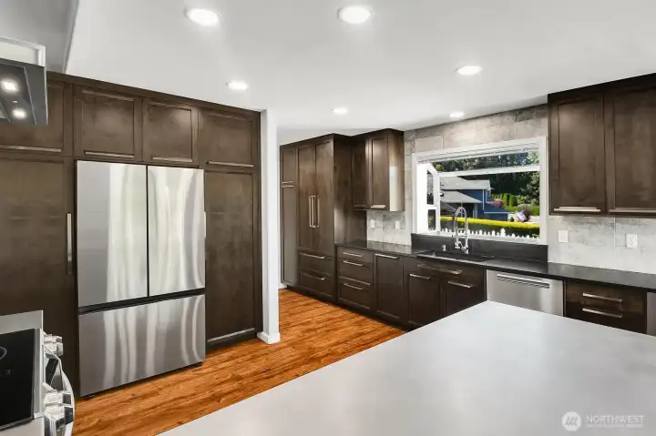 The beautifully designed custom chef's kitchen showcases exceptional craftsmanship and premium finishes throughout. Featuring all-new, high-end appliances and custom top-of-the-line cabinetry, this space offers the perfect blend of luxury, style, and functionality. The beautifully designed custom chef's kitchen showcases exceptional craftsmanship and premium finishes throughout. Featuring all-new, high-end appliances and custom top-of-the-line cabinetry, this space offers the perfect blend of luxury, style, and functionality.