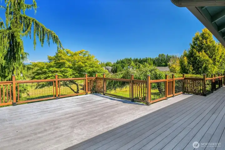 The gated wraparound deck extends your living space outdoors, providing the perfect setting for entertaining, dining al fresco, or simply relaxing. The gated wraparound deck extends your living space outdoors, providing the perfect setting for entertaining, dining al fresco, or simply relaxing.